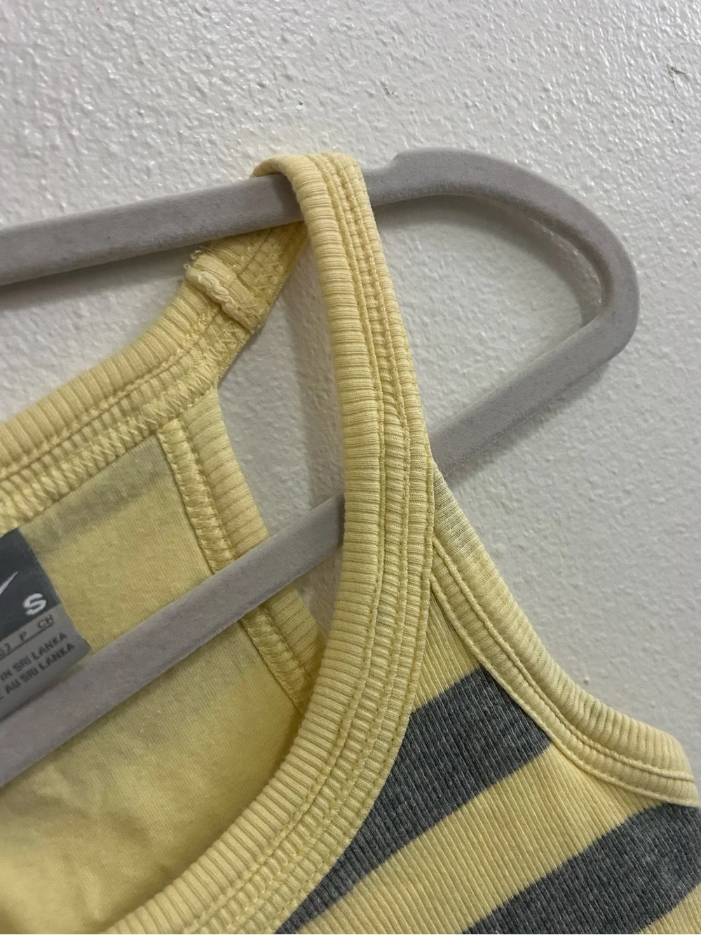 Nike striped ribbed tank top with built in shelf bra